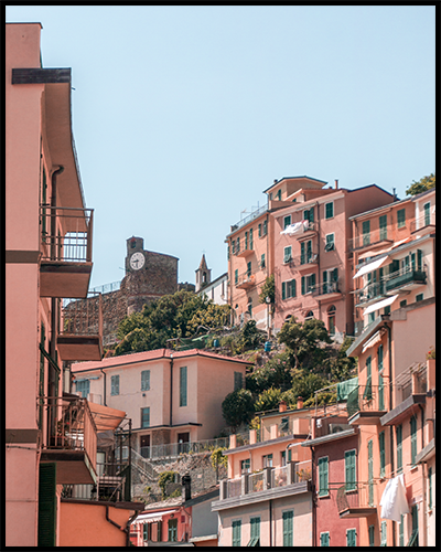 Poster featuring pink houses hill-top houses in Riomaggiore (Italy). Create an inspiring gallery wall with our posters from the Cinque Terre Collection. 
